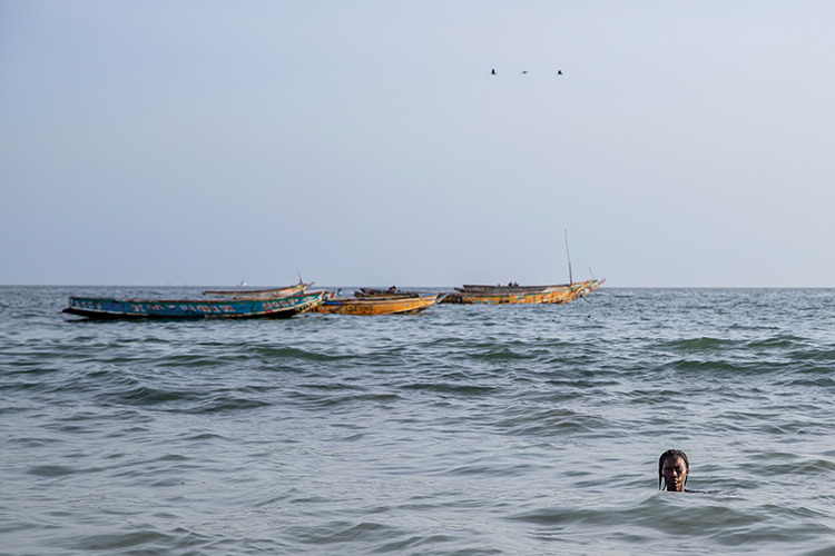 Since being returned to Senegal, Salamba spends a lot of time alone, finding it difficult to mix with others