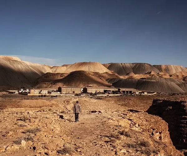 The Kef Eddour mine, opened in 1985, is currently one of the biggest phosphate mines in the Gafsa Valley. The mounds in the background are from the impurities washed from the phosphate