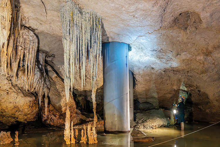 Campaigner Guillermo D Christy examines one of the giant pillars penetrating a cenote to support the new train line – 17,000 of such steel-encased concrete pylons are going to be driven into the fragile, karst landcape