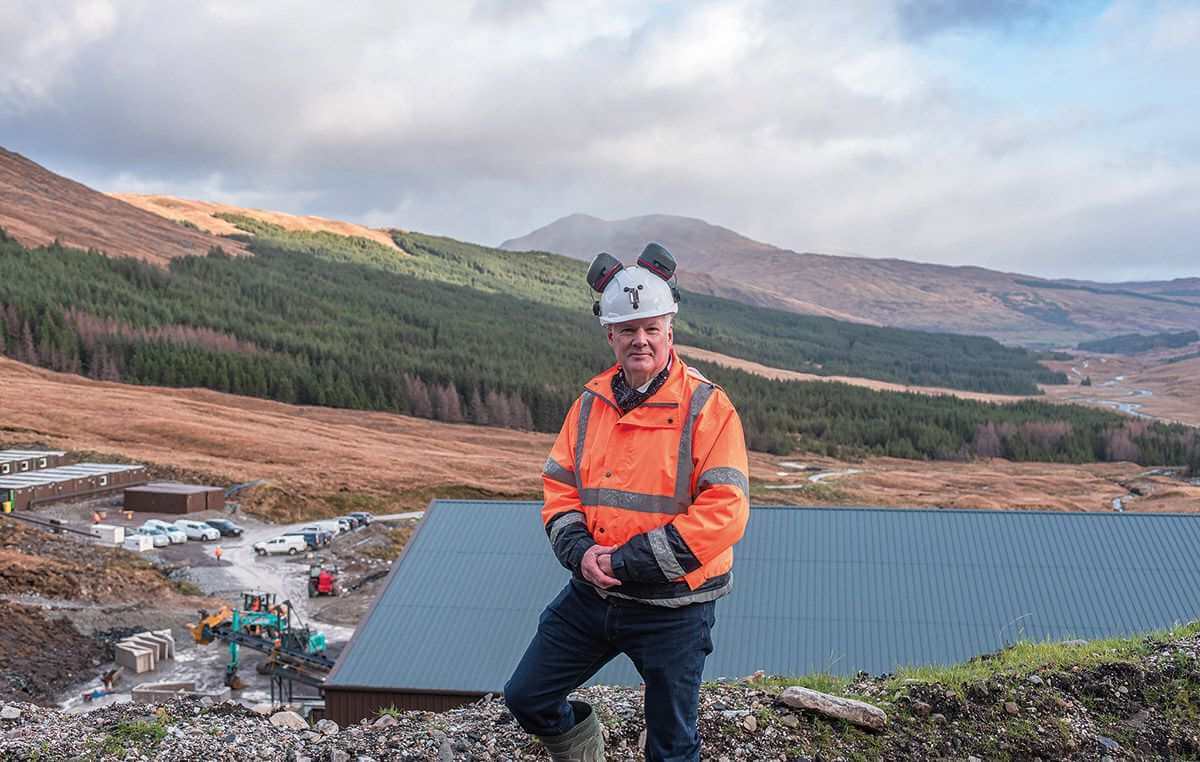Richard Gray, CEO of Scotgold, stands before the Grampian Mountains