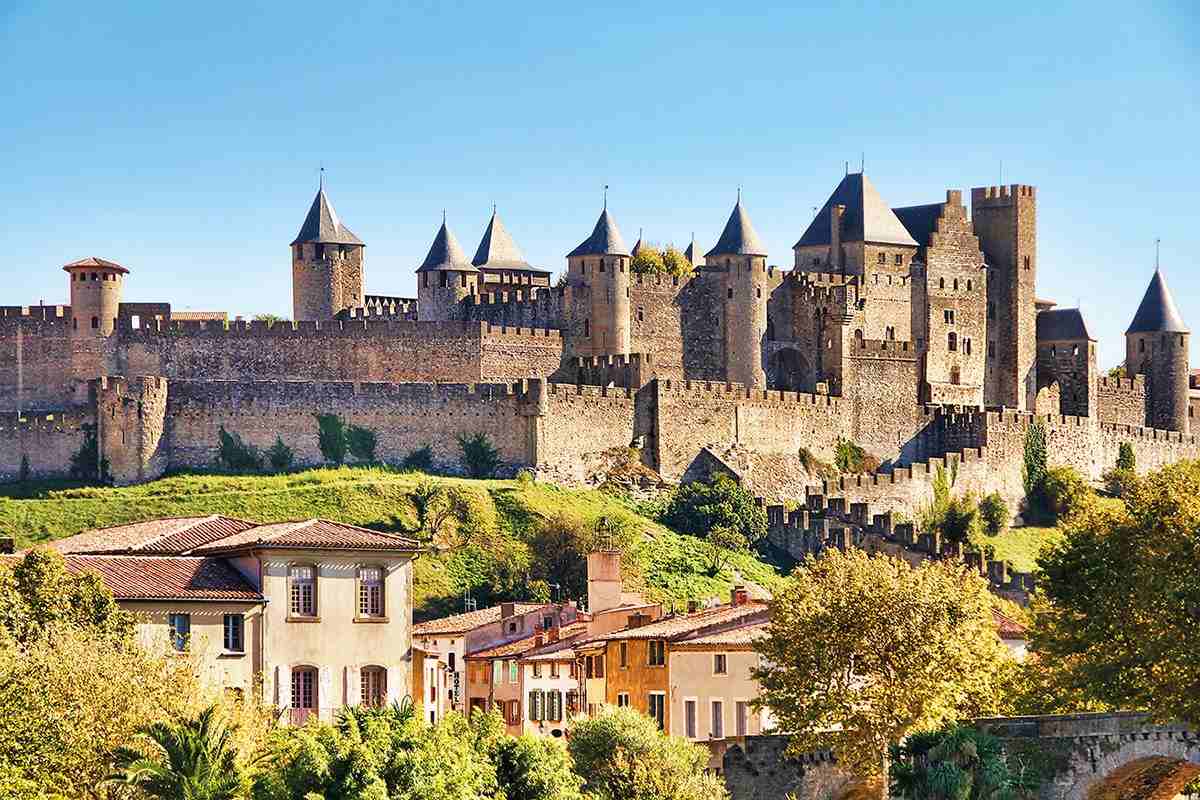 Carcasonne castle atop a hill against blue sky