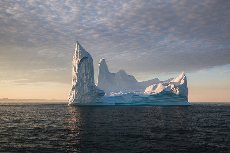 A gigantic iceberg floats off the coast of Greenland