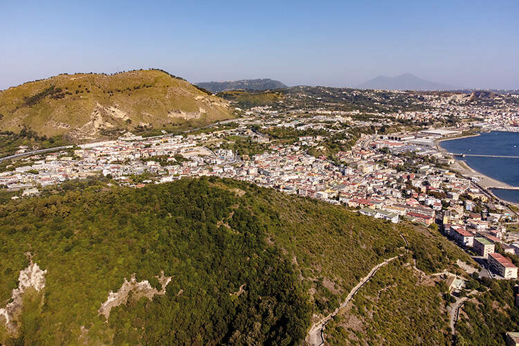 The town of Pozzuoli with the craters of Monte Nuovo Monte Guaro in the distanc