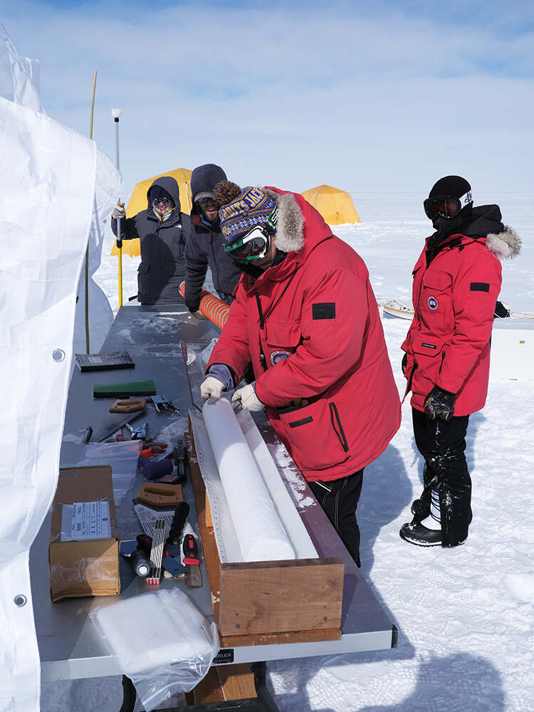 Jihong Cole-Dai processes an ice core section for shipment back to the USA