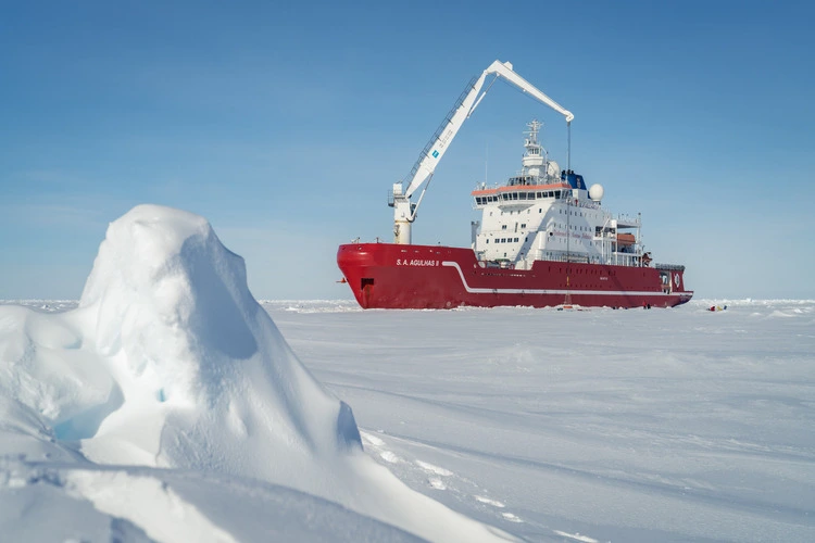 The S.A. Agulhas II as seen from the ice floes of Antarctica. 