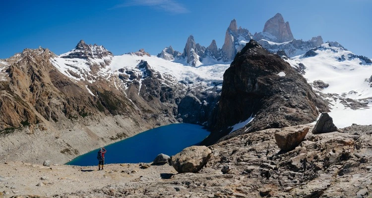 A breathtaking view of the Fitz Roy mountain range in Patagonia, Argentina, captured on a clear day. 