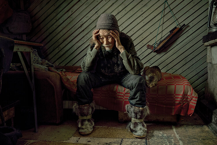 Nikolai, a Chukchi elder from Enurmino, remembers the time before Russian colonisation, when people sometimes died if the hunting season was poor but they were generally happier, living off the land and sea in balance with the spirits. He lived in an abandoned meteorological station by the sea with his wife until she passed away last year