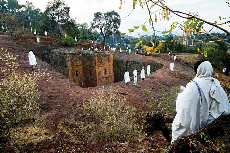 Worshippers at one of the ancient churches carved into the rock at Lalibela