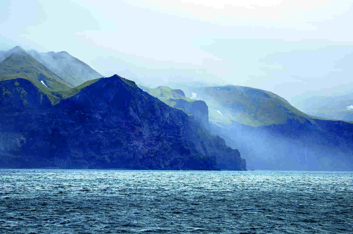 The misty cliffs of Jan Mayen island