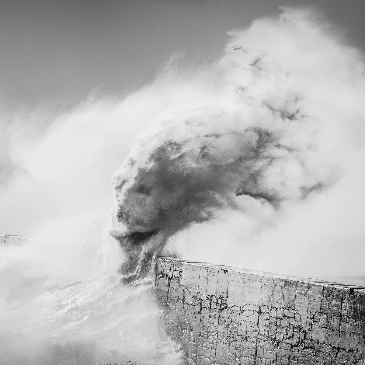 'Loki' fast shutter speed of a wave breaking against a sea wall