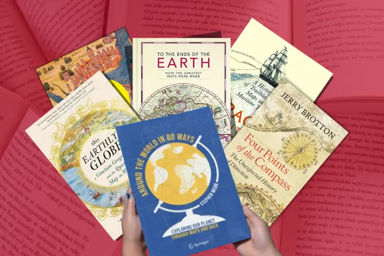 our selection of six best map books, arranged as covers, being held by a hand