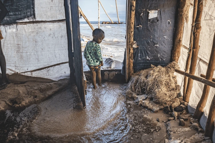 The encroaching sea starts to flood a little girl’s home