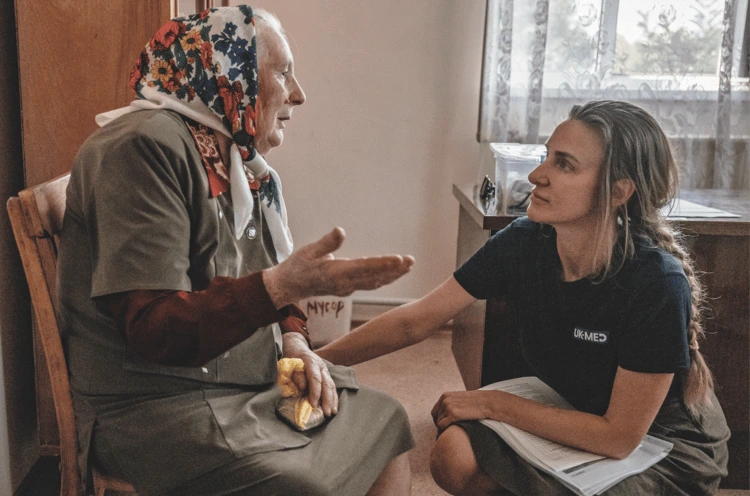 Psychologist Tatiana Yevstratova reassures Hanna at a mobile clinic in Dymitzvika village, Kharkiv. An estimated 54 per cent of Ukrainians have post-traumatic stress disorder, another 21 per cent suffer from severe anxiety