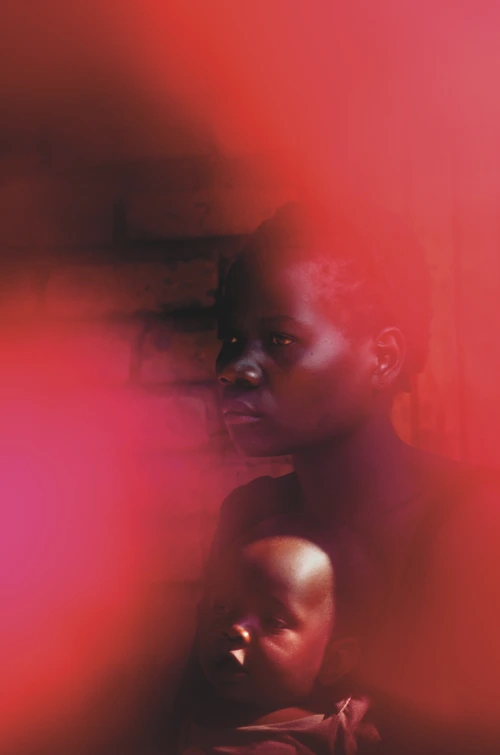 Enala Etifala, 19, with her baby