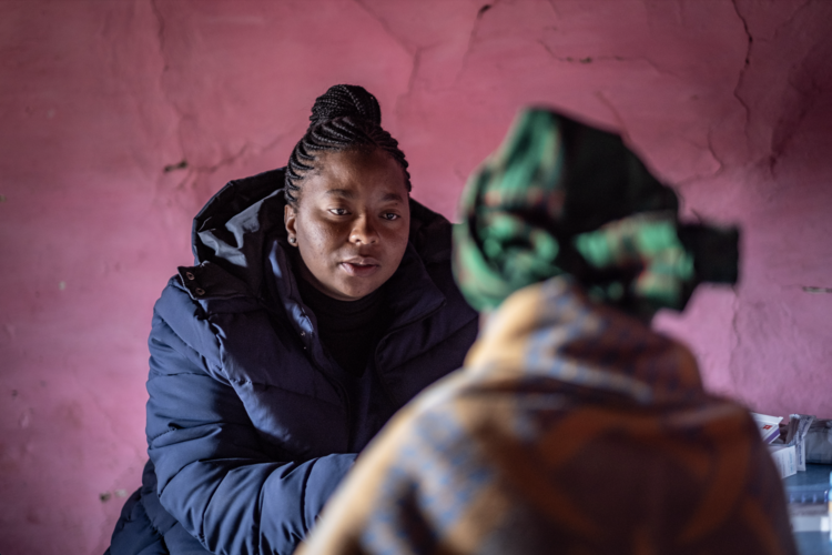 Nurse assistant Thandeka Potomane, 30, sees a patient during a now-
rare outreach mission to the isolated village of Ha Pheulane in the highlands of Lesotho... Potomane says that since the cuts, her clinic has been struggling to cope