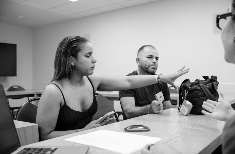 Indira pauses during a meeting with her lawyer at St Peter’s Church. While her husband’s asylum case progressed, she and their daughters received deportation orders.