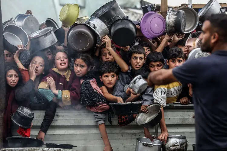 Desperate children plead for food in Gaza