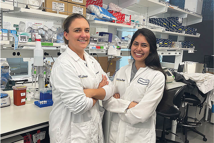 Andie Smidler (left) and Reema Apte, reseachers in the Akbari Laboratory