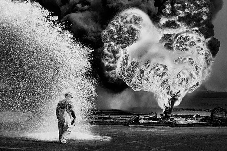 Fires burning out of control 30 days after the end of the Kuwait war, Greater Burgan Oil Field, 1991