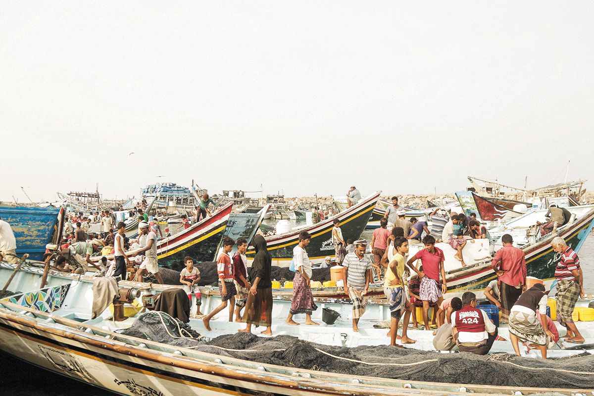 Fishermen at work in Al Hudaydah port, Yemen