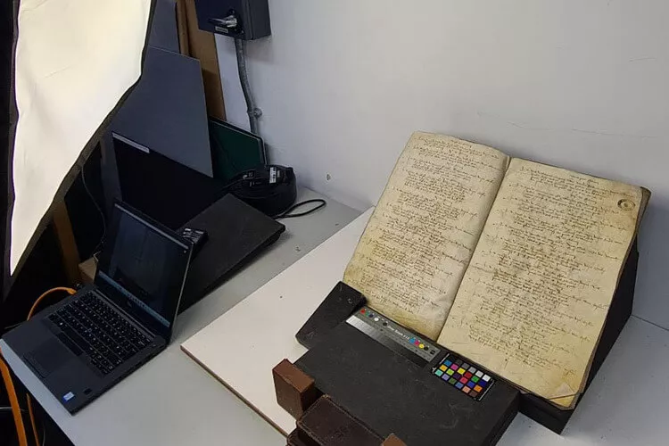 A port book being digitally transferred
