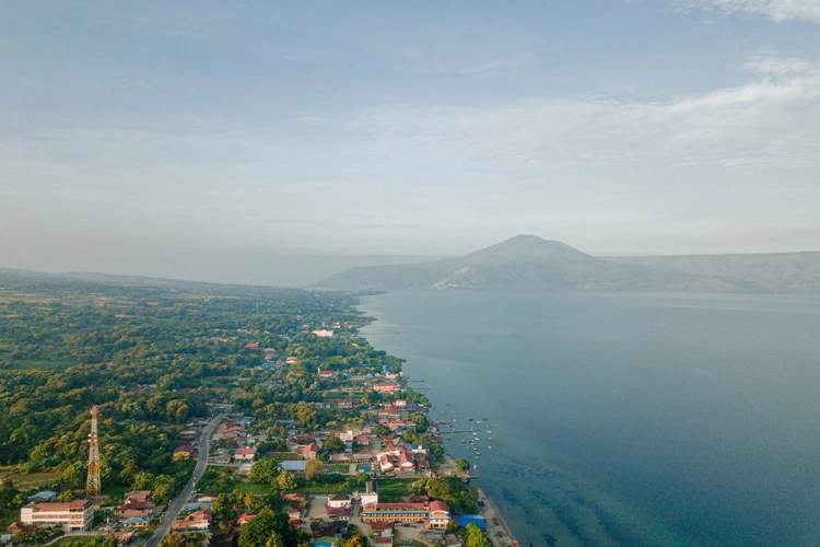 Aerial drone view of Batak village near Toba Lake at Pangururan in Samosir Island, Sumatra Utara, Indonesia