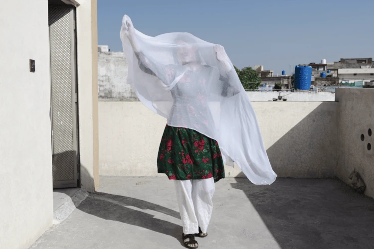 Amina, 28, was working as a maths teacher in Afghanistan when she was arrested by the Taliban. After being released from custody, she escaped the country with the rest of her family.