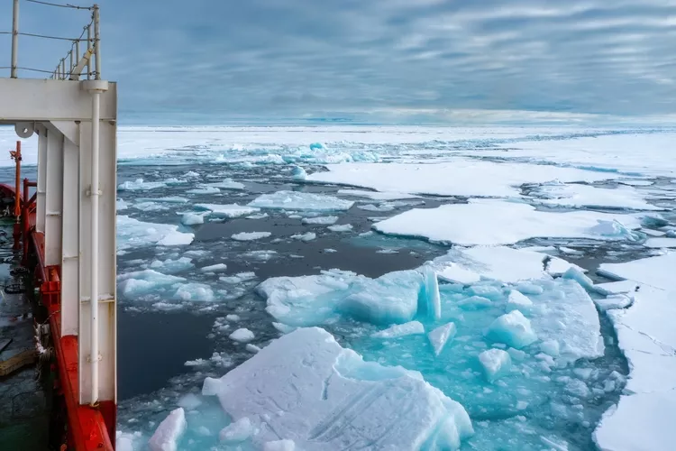 A ship sailing through the Arctic