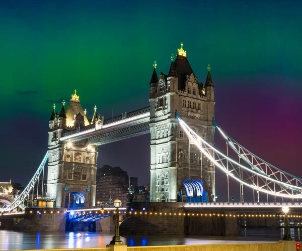 ower Bridge with aurora borealis in London. England