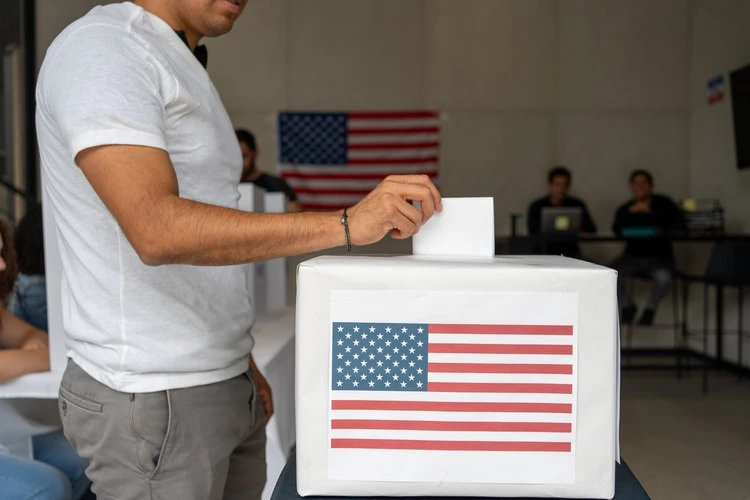 Man places vote in ballot box