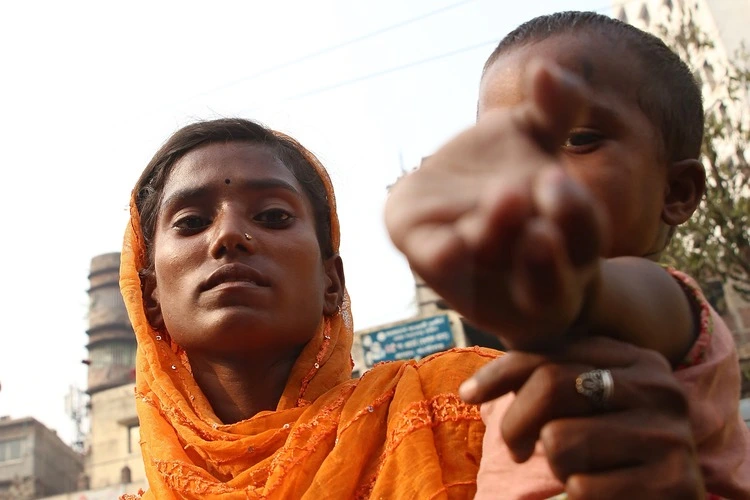 Dhaka, Bangladesh - April 4, 2024 - People begging for food. In Bangladesh 40 million people remain food insecure and 11 million suffer from acute hunger.