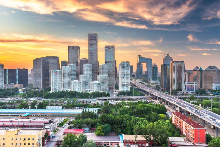 Beijing, China modern financial district skyline at dusk.