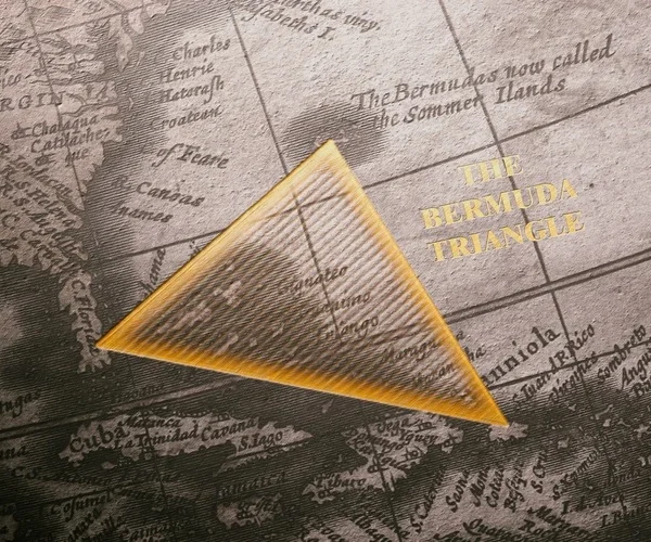 A meticulously detailed old map featuring the Atlantic Ocean prominently marks the mystifying Bermuda Triangle