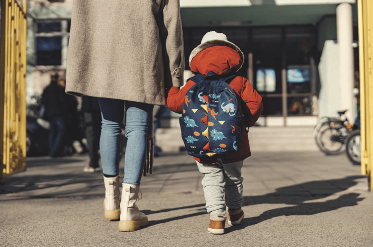 Child walking with parent