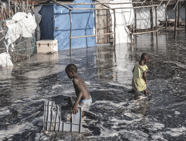 Children playing in the flood water