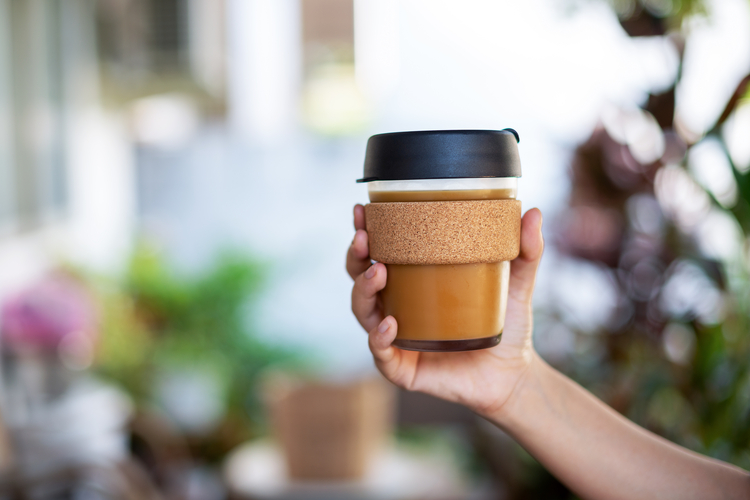 A coffee cup in hand