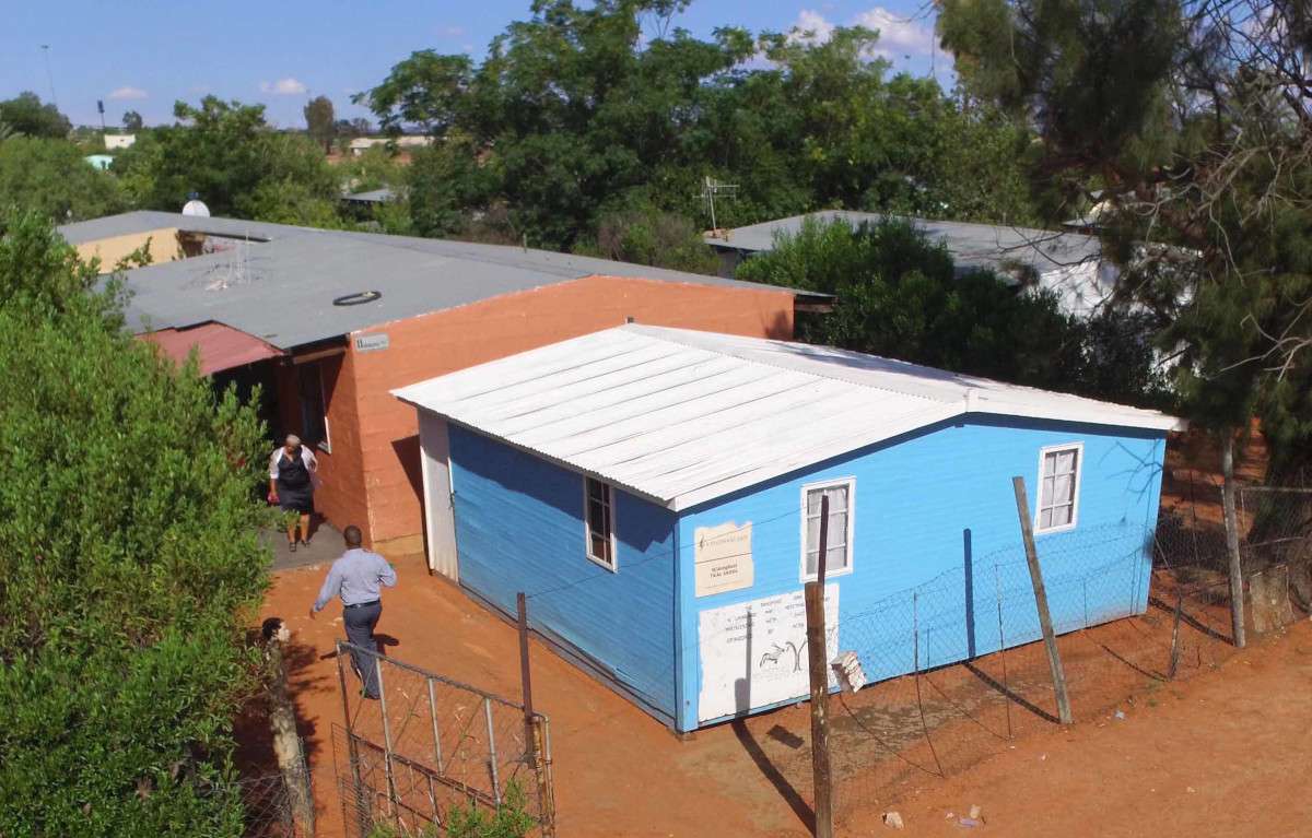 A building in South Africa with white, solar-reflective paint covering its roof 