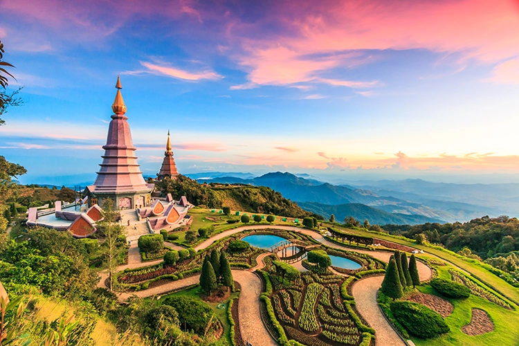 An aerial view over a pagoda and mountains in Doi Inthanon national park