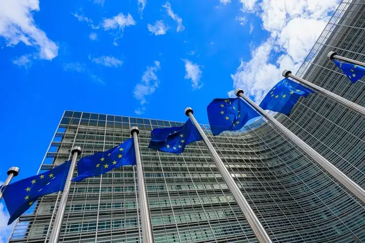 European flags in front of the Berlaymont building, headquarters of the European Commission in Brussels