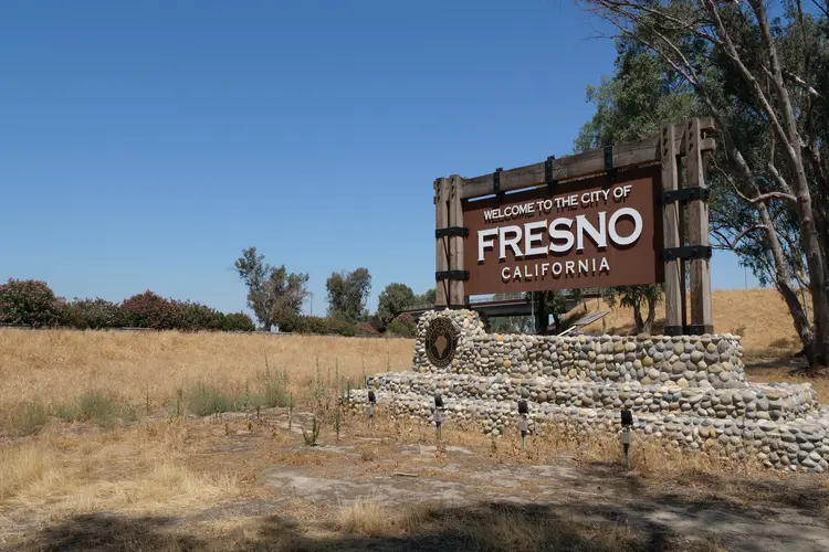 City of Fresno Sign Fresno , California, UNITED STATES - July 1, 2018. Entrance sign to the city of Fresno, California. Taken in the morning.