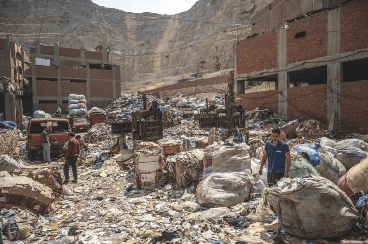 Waste is sorted inside Garbage City, the best-known of Cairo’s Zabbaleen neighborhoods, which lies at the base of the Mokattam Hills