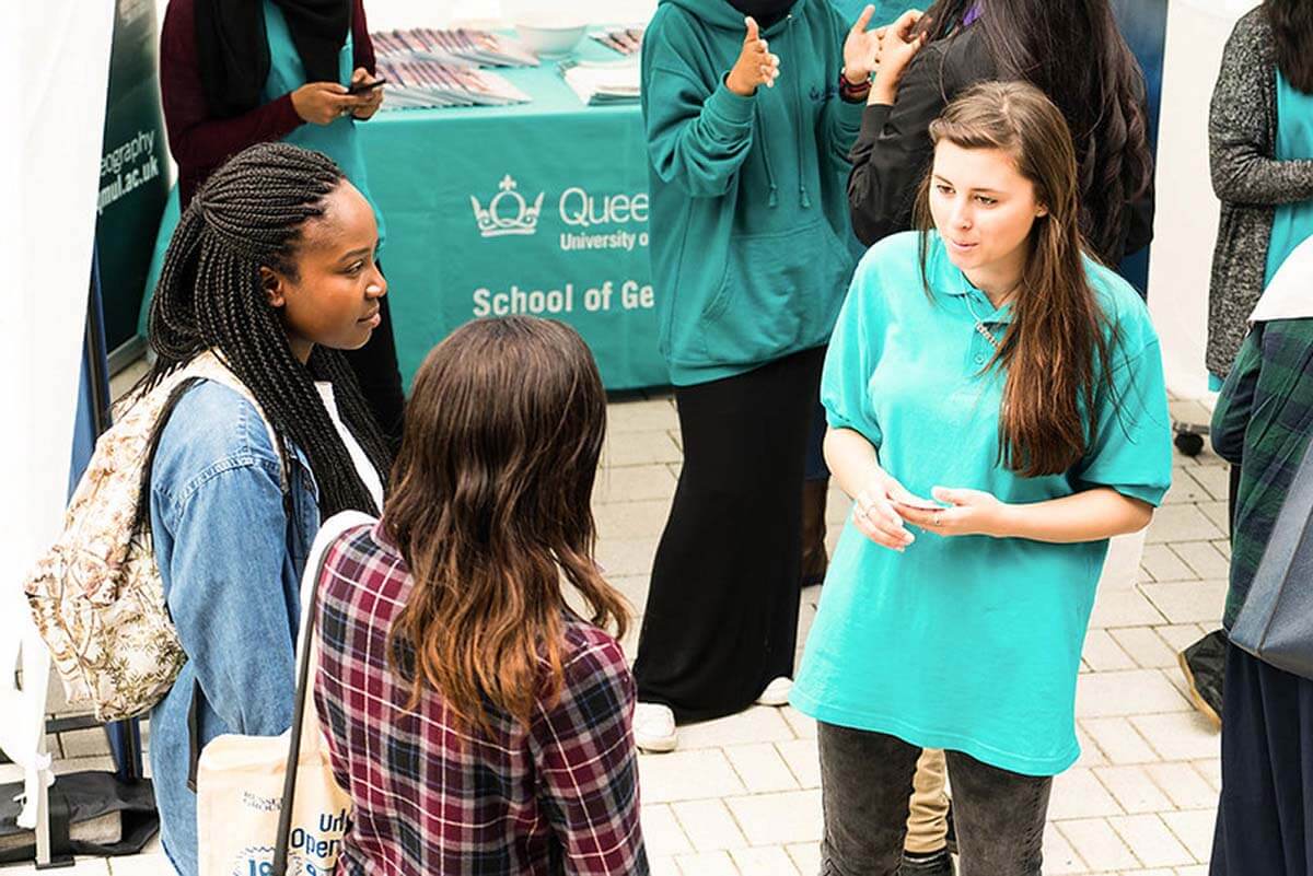 A goegraphy ambassador talking to potential students