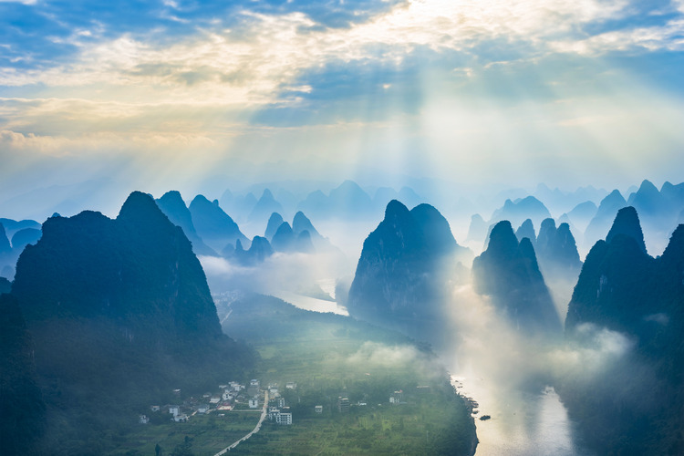 Landscape of Guilin, Li River and Karst mountains - located near The Ancient Town of Xingping, Yangshuo County, Guangxi Province, China.