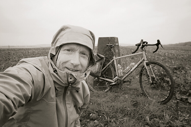 Alastair Humphries and his bike in the english countryside