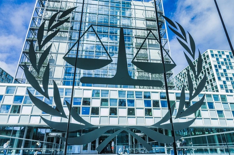 The Hague, Netherlands - april 19 2016: the logo of the ICC international criminal court at the entrance infront of the building itself.