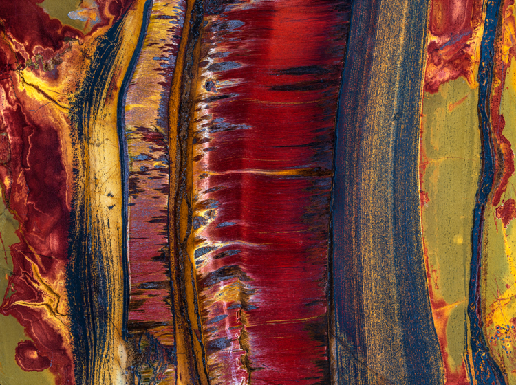 Like sunlight caught in stone, a tiger’s eye gemstone shimmers with golden bands