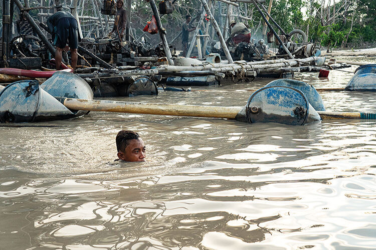 Thirteen-year-old Ikran dropped out of school two years ago to start work as a miner