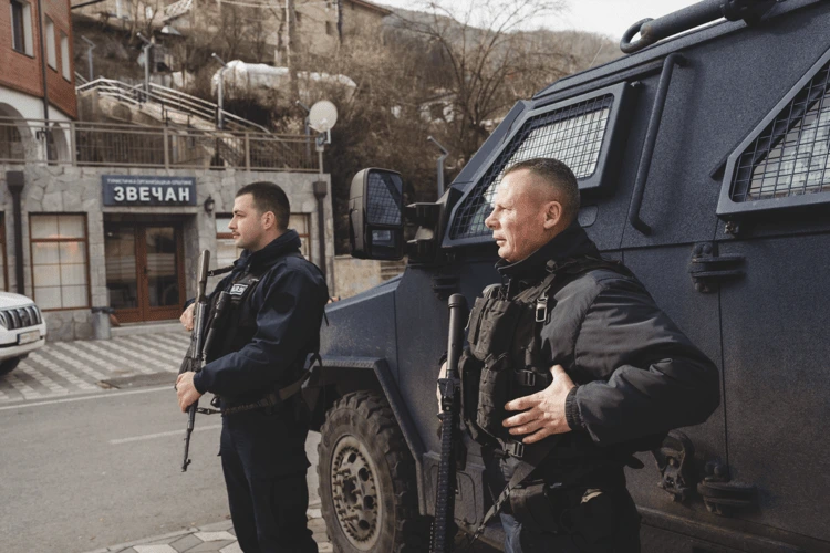 Heavily armed Kosovan police in the village of Banjska, where
three Serbian militants were killed last year