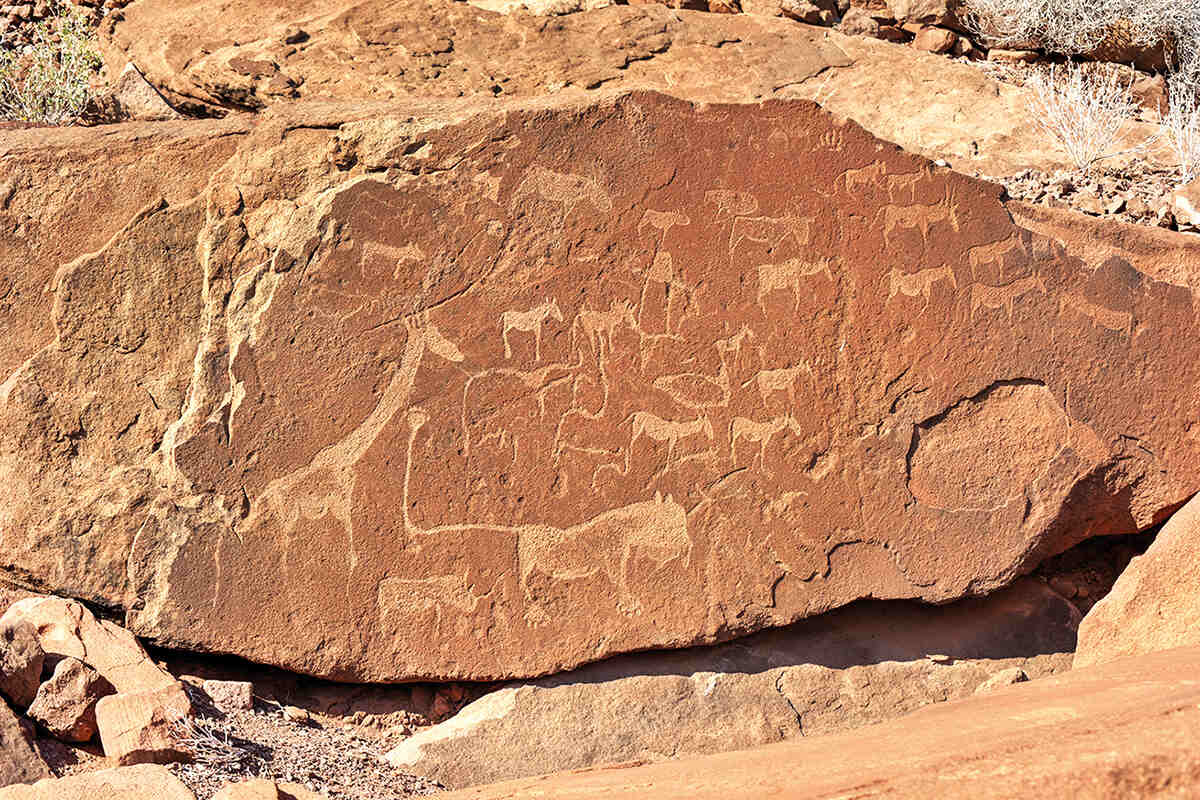 Carvings on a rock twyfelfontein Namibia