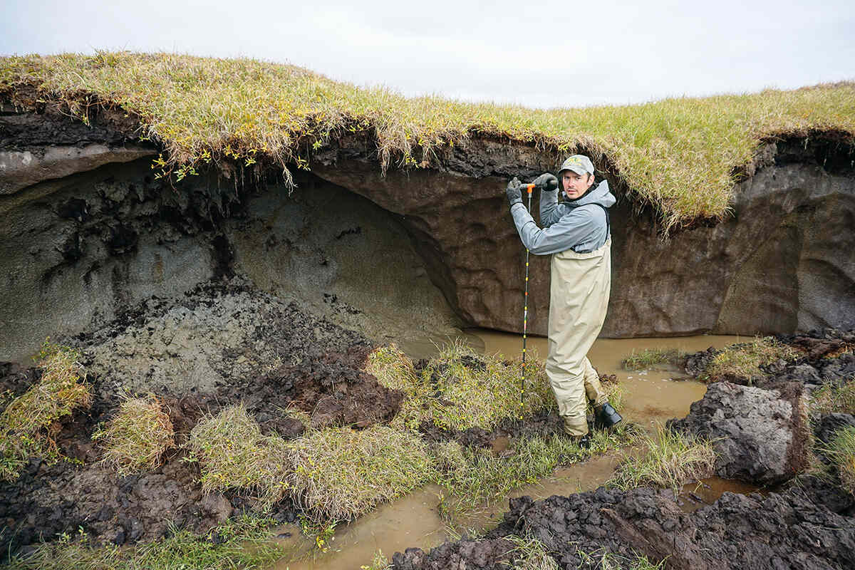 Measuring the permafrost depth beside an Alaskan lake